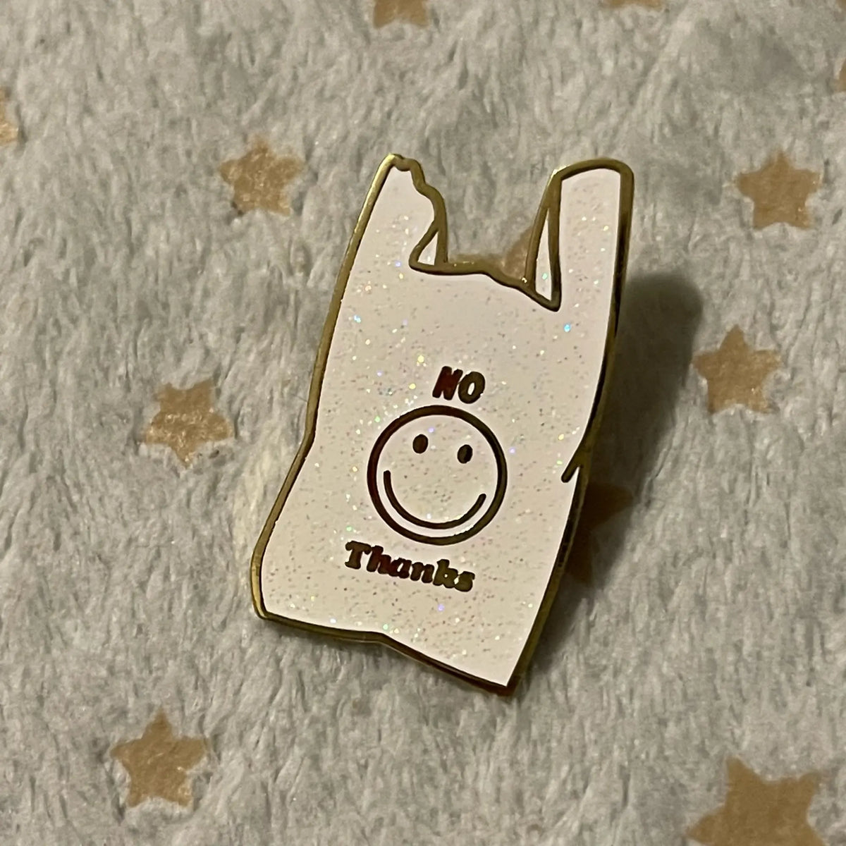 No Thanks pin in hand - real sparkle detail