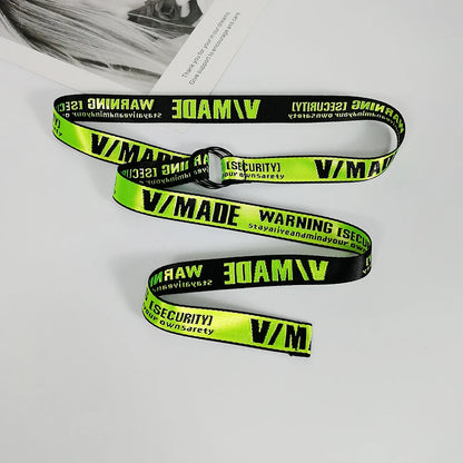 Neon green slogan belt coiled with double D-ring