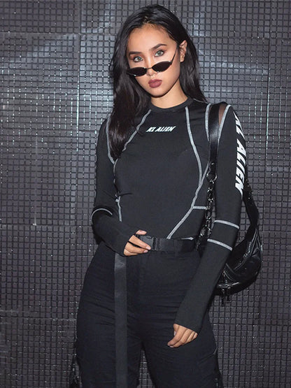Harness topstitching detail on mesh bodysuit