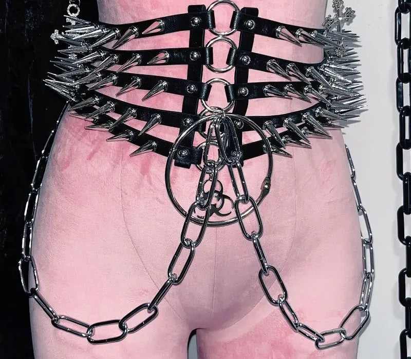 Chain draping across the hip