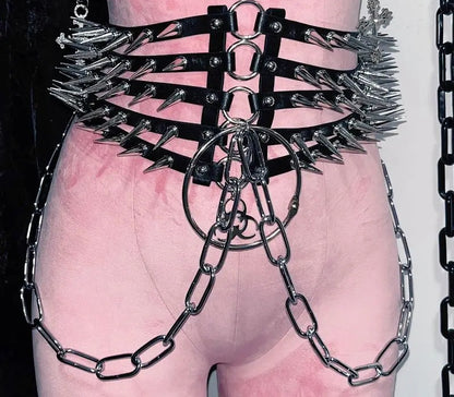 Chain draping across the hip