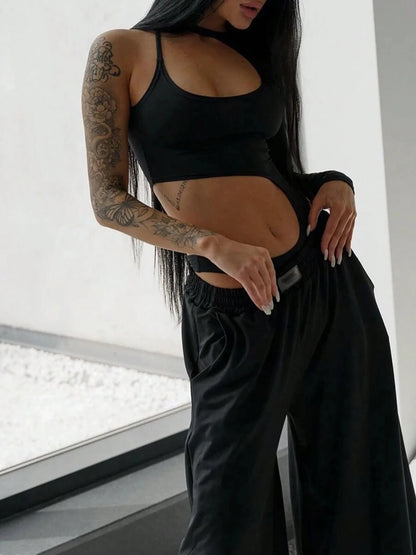 Black cutout bodysuit styled with wide-leg trousers