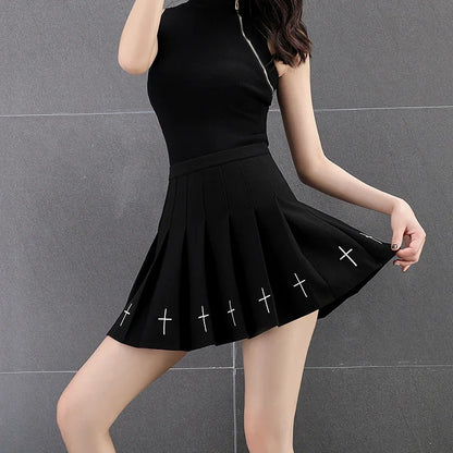 Black cross print pleated mini skirt in motion