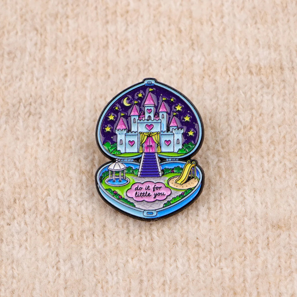 Enamel pin on a knit background