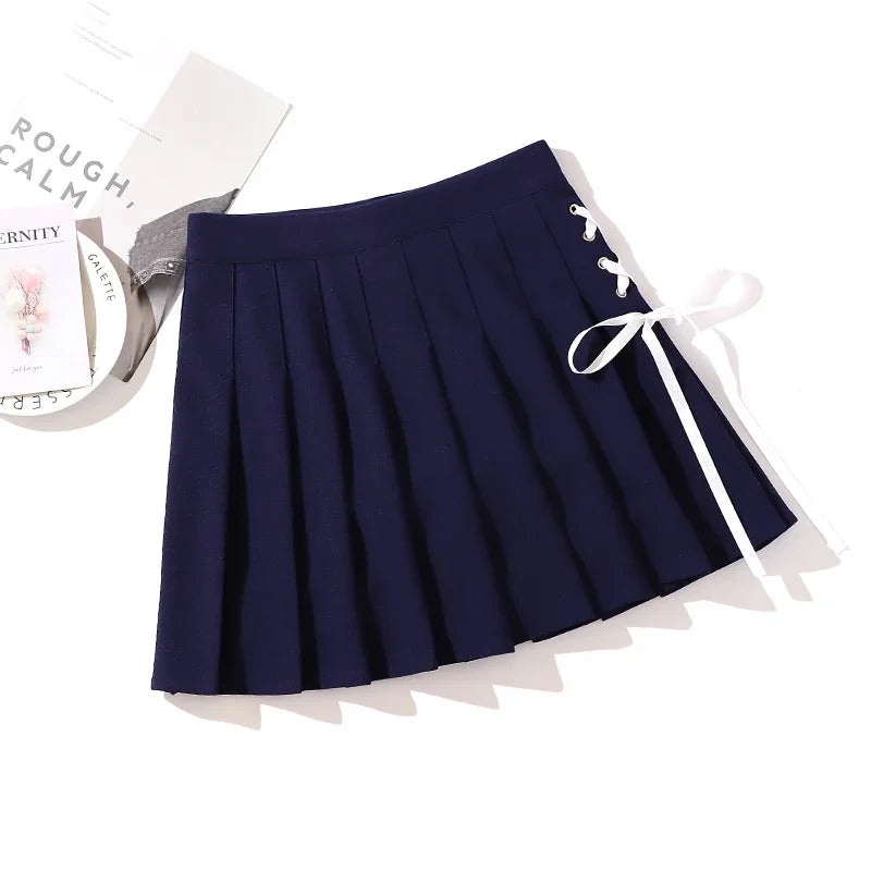 Navy pleated mini skirt with white side ribbon lacing