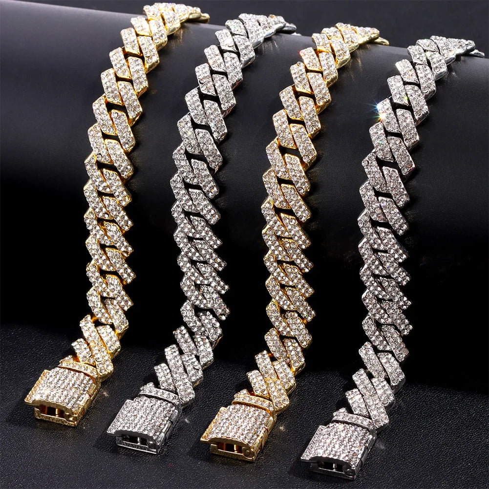 Gold and chrome iced Cuban link chains side by side