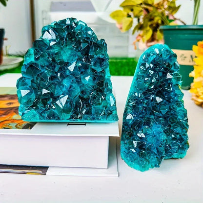 Two aura crystal clusters shown side by side