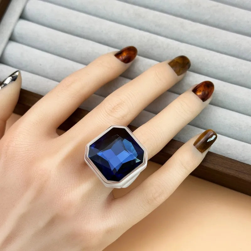 Midnight Navy faceted cocktail ring worn