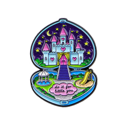 Detail of the moonlit castle and slide inside the compact