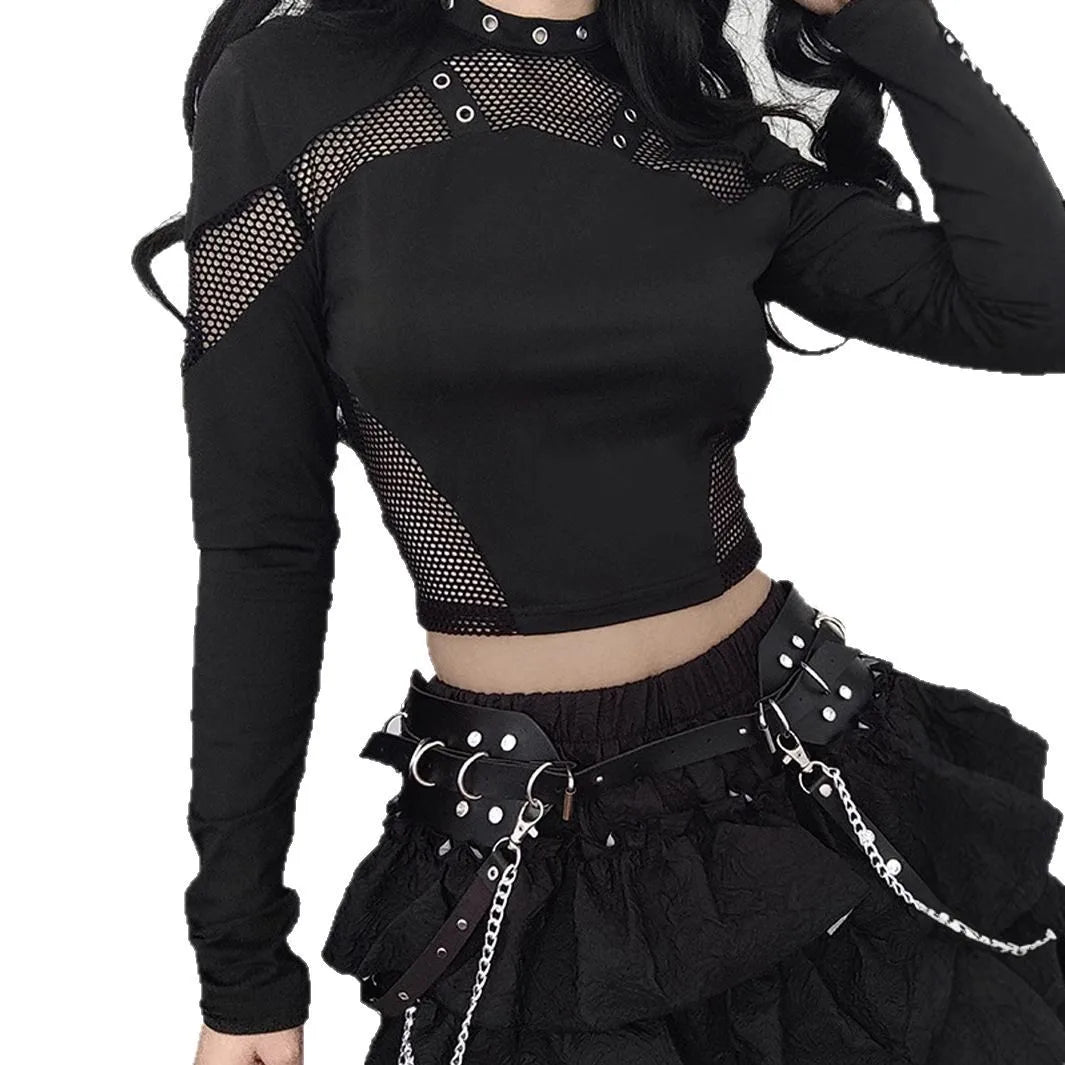 Black mesh panel crop top styled with a ruffled skirt