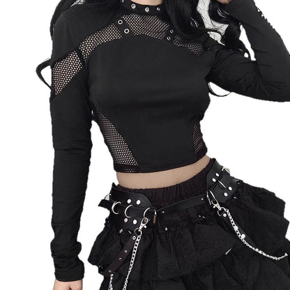 Black mesh panel crop top styled with a ruffled skirt