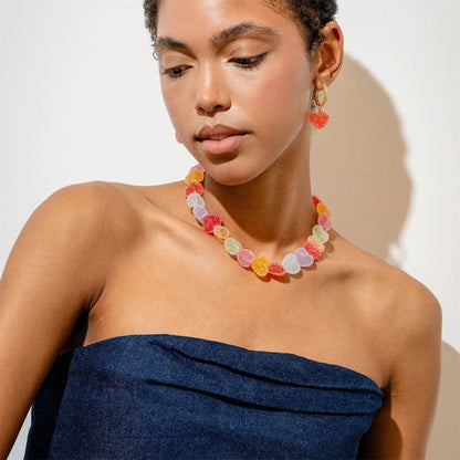 Candy heart choker styled with a strapless top