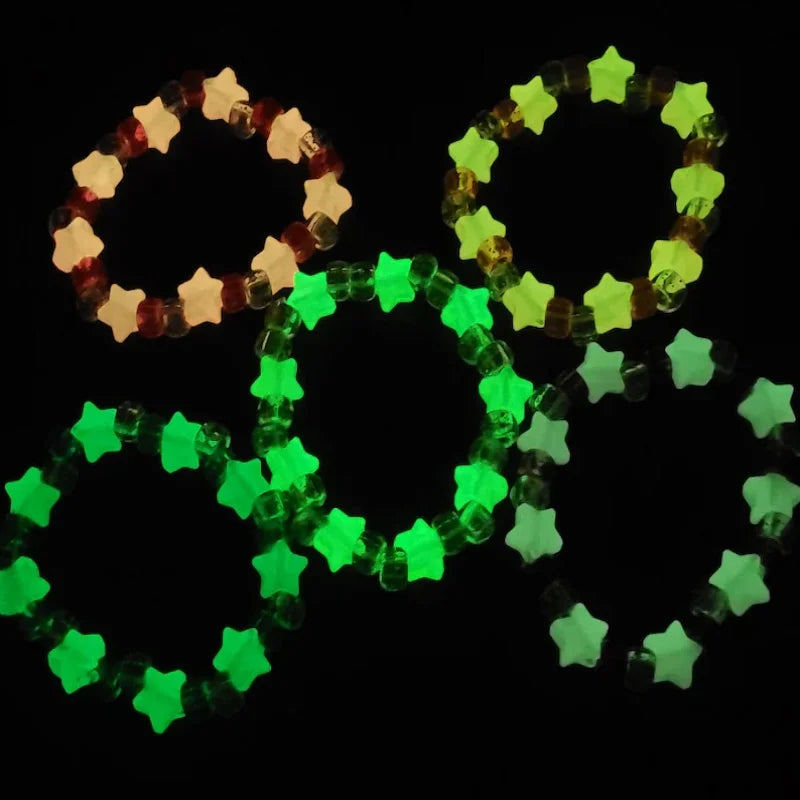 Green glow star bracelets in the dark