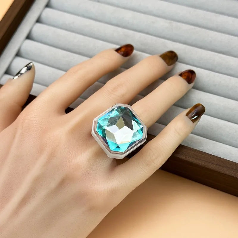 Glacier light blue faceted cocktail ring worn