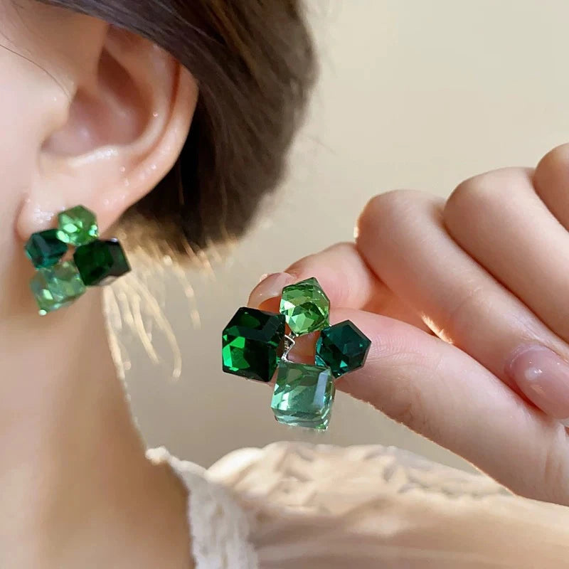 Green crystal cube cluster studs on the ear