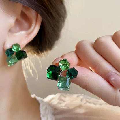 Green crystal cube cluster studs on the ear