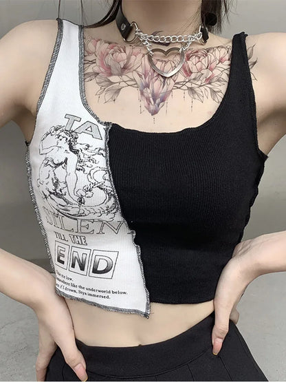 Spliced punk crop tank styled with a black pleated skirt
