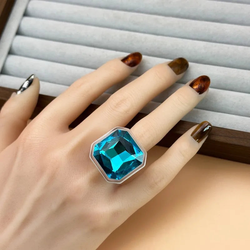 Ocean Blue faceted cocktail ring worn