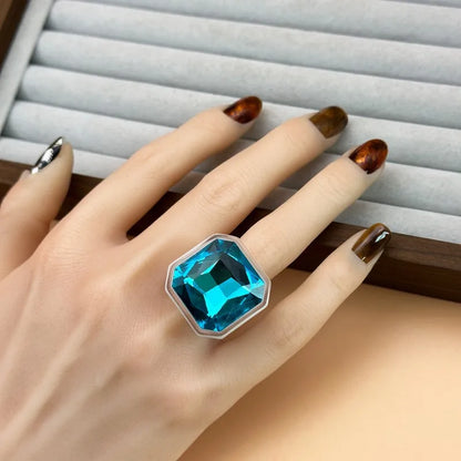 Ocean Blue faceted cocktail ring worn