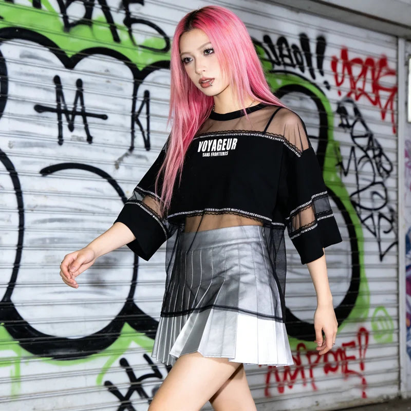 Mesh tee styled with a pleated skirt