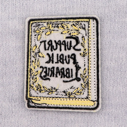 Reverse of the patch showing iron-on backing
