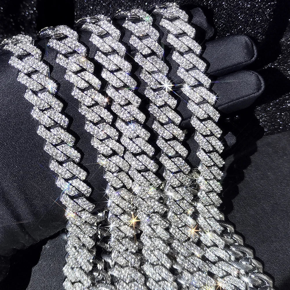 Chrome-silver iced Cuban link chains held up close