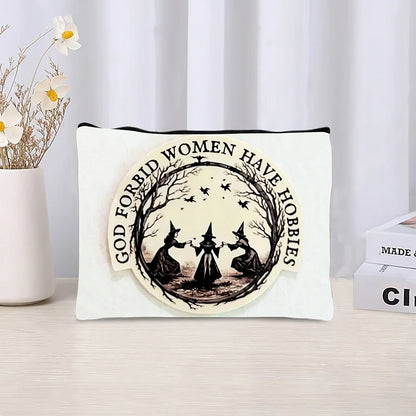 Witch print zip pouch styled on a vanity