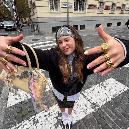 Street style shot with the eyelet headband worn out