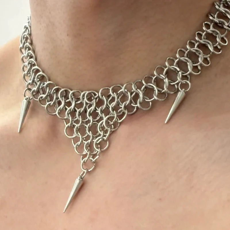 Chainmail collar spike detail on skin