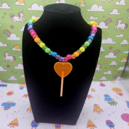 Orange Crush lollipop heart kandi necklace