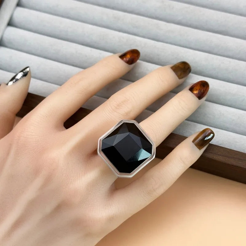 Onyx black faceted cocktail ring worn