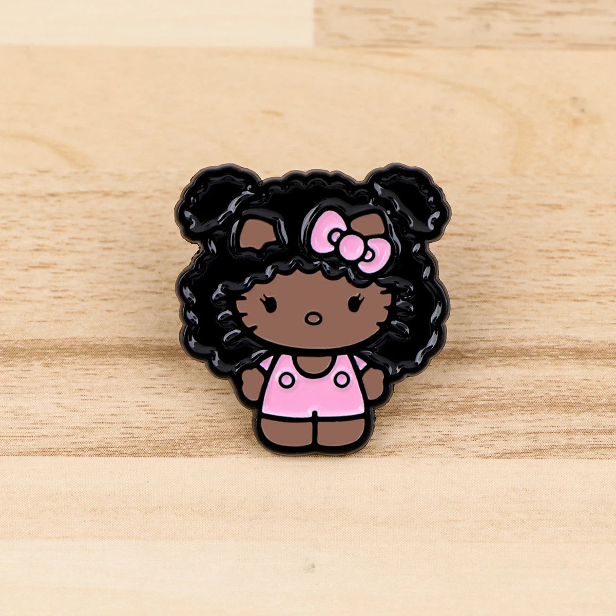 Enamel pin on wood surface