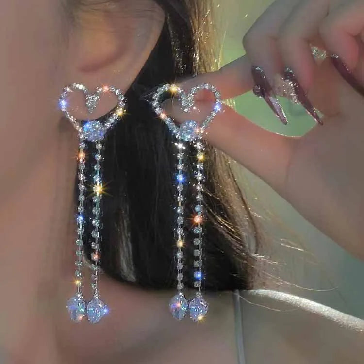 Silver rhinestone heart earrings with long crystal fringe chains
