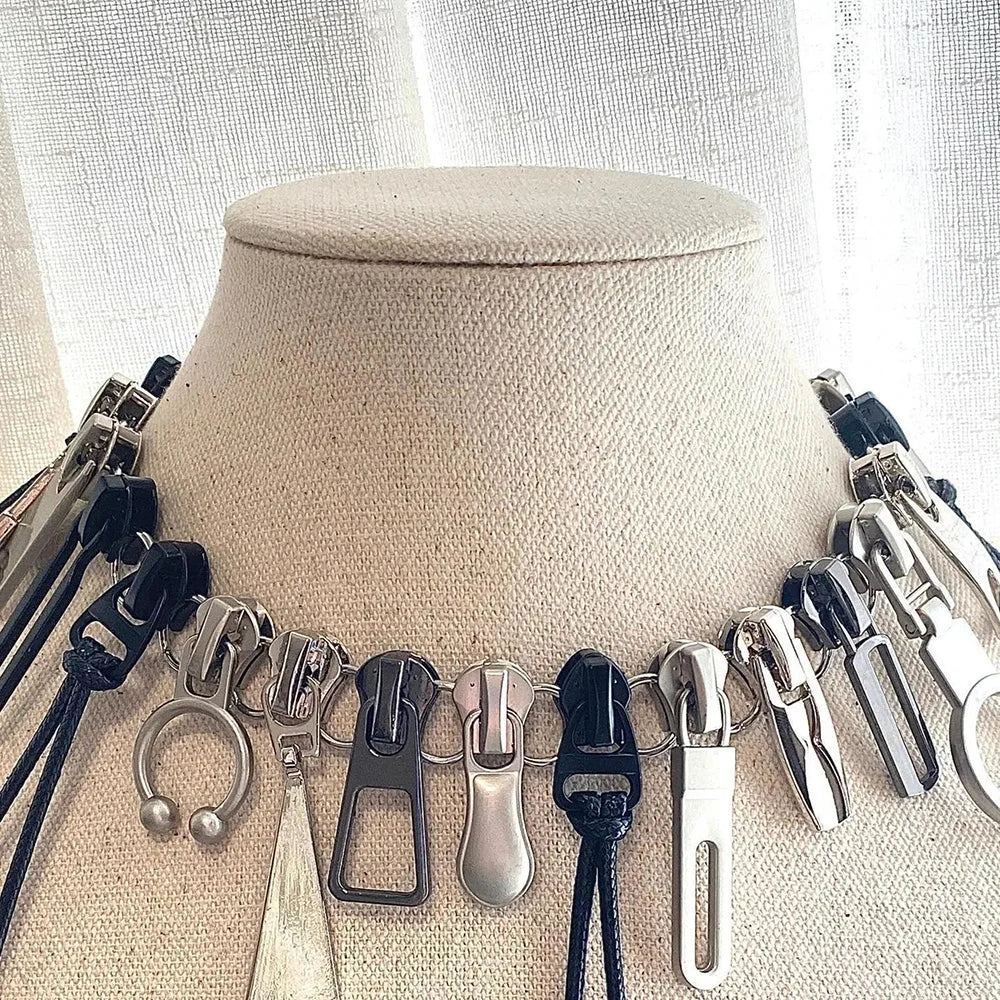 Zipper pull fringe choker on display form