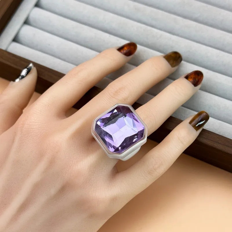 Amethyst faceted cocktail ring worn