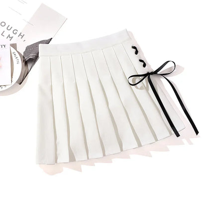 White pleated mini skirt with black side ribbon lacing
