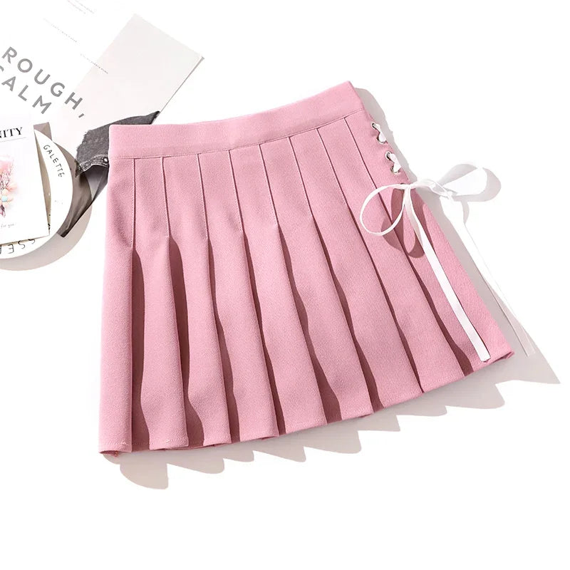 Pink pleated mini skirt with white side ribbon lacing