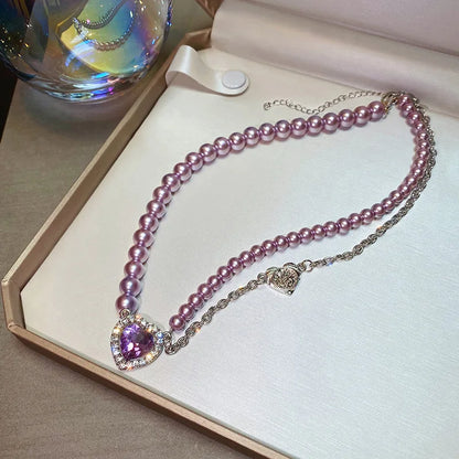 Lilac pearl heart necklace laid flat