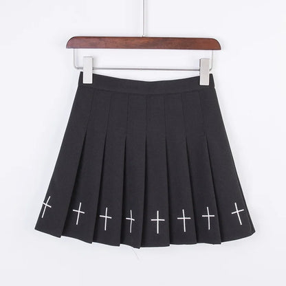 Black pleated mini skirt with white embroidered crosses