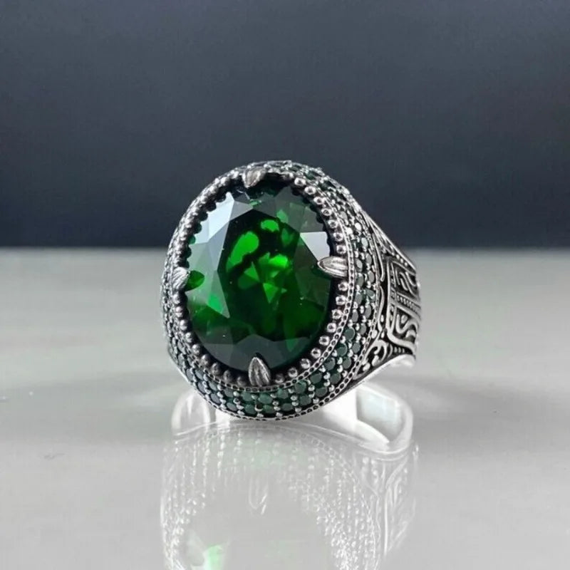 Green stone signet ring angled view