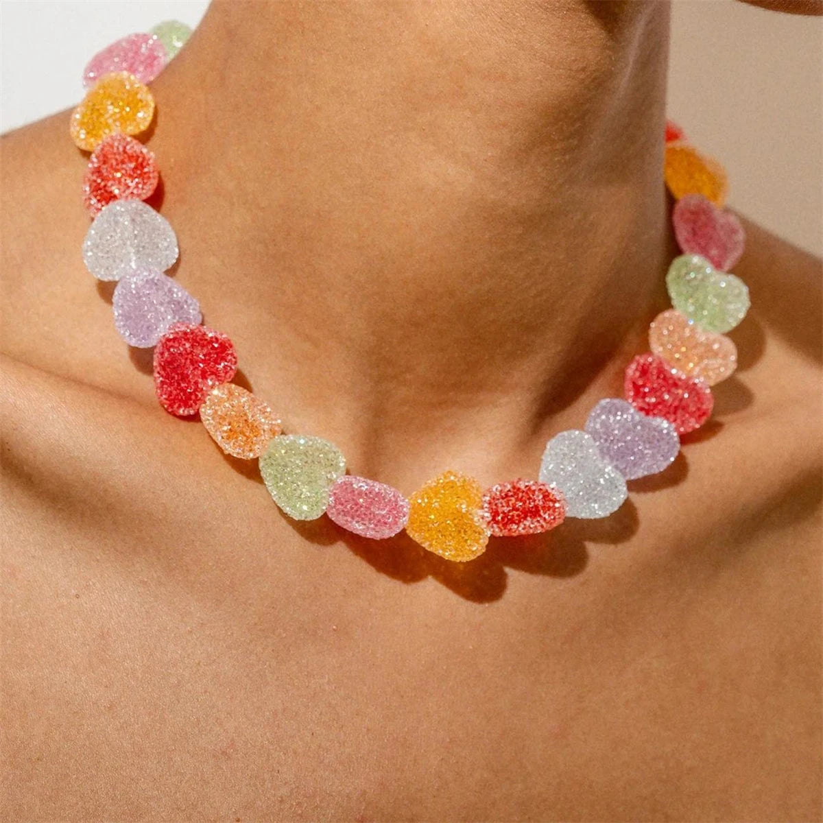 Candy heart beaded choker worn on the collarbone