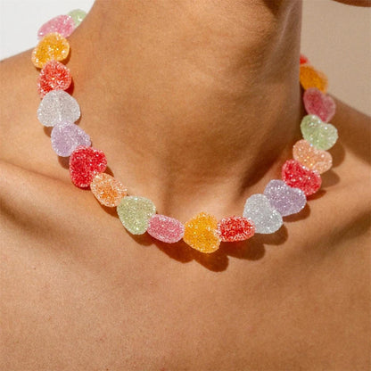 Candy heart beaded choker worn on the collarbone
