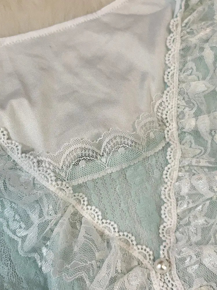 Scalloped lace edge and lining panel detail