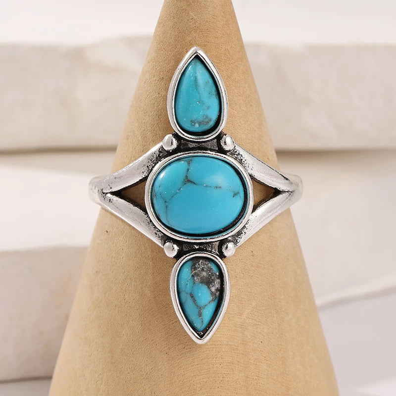 Turquoise ring displayed on a stand