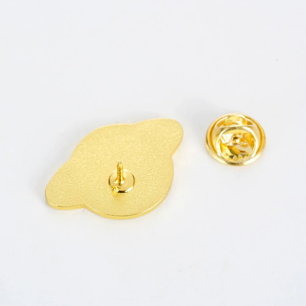 Reverse of the enamel pin showing the butterfly clutch back