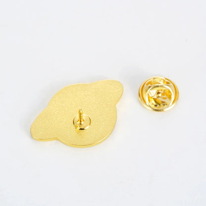 Reverse of the enamel pin showing the butterfly clutch back
