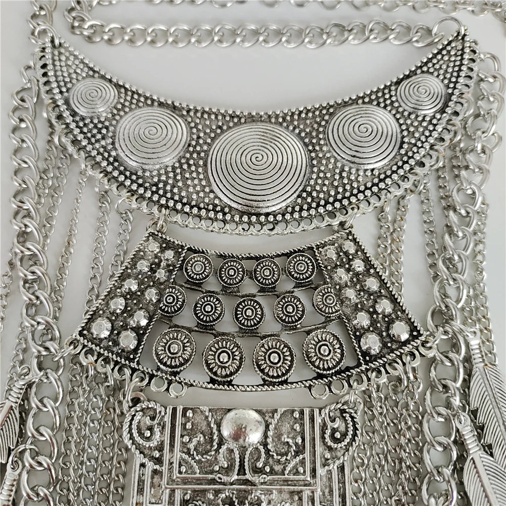 Layered chain and leaf tassel detail