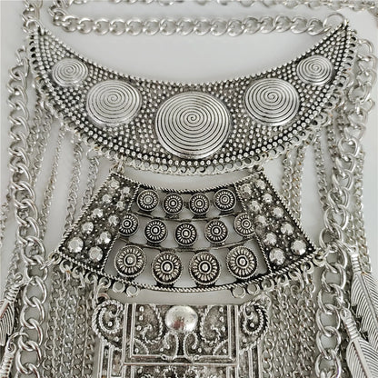 Layered chain and leaf tassel detail