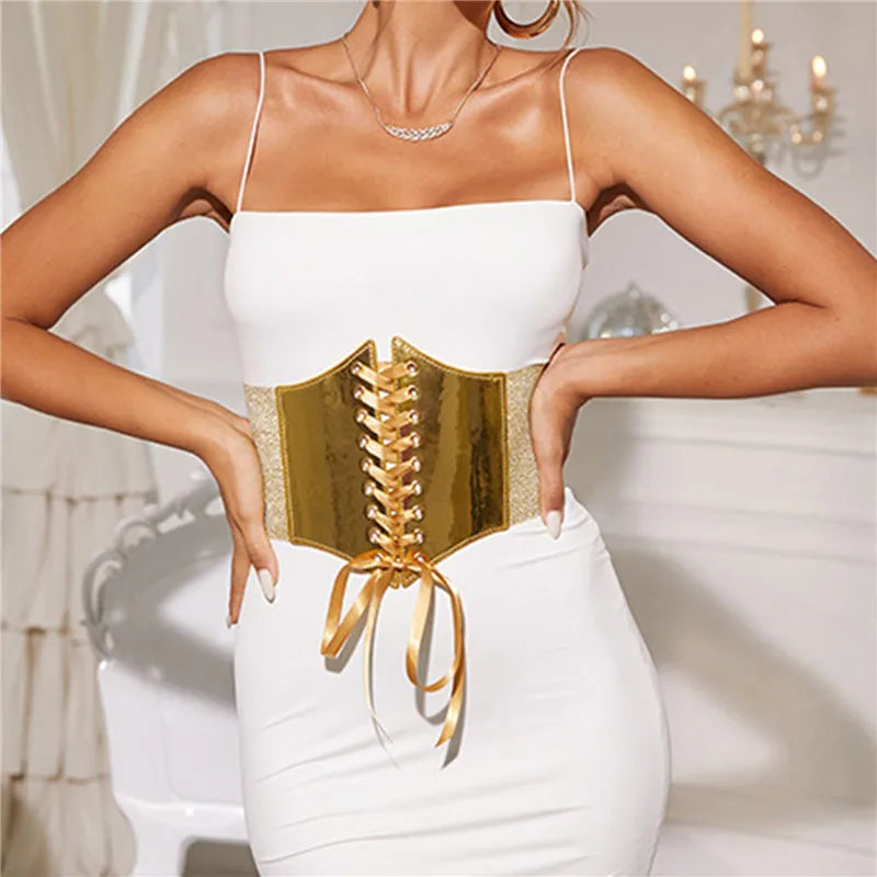 Gold corset belt styled with long ribbon ties