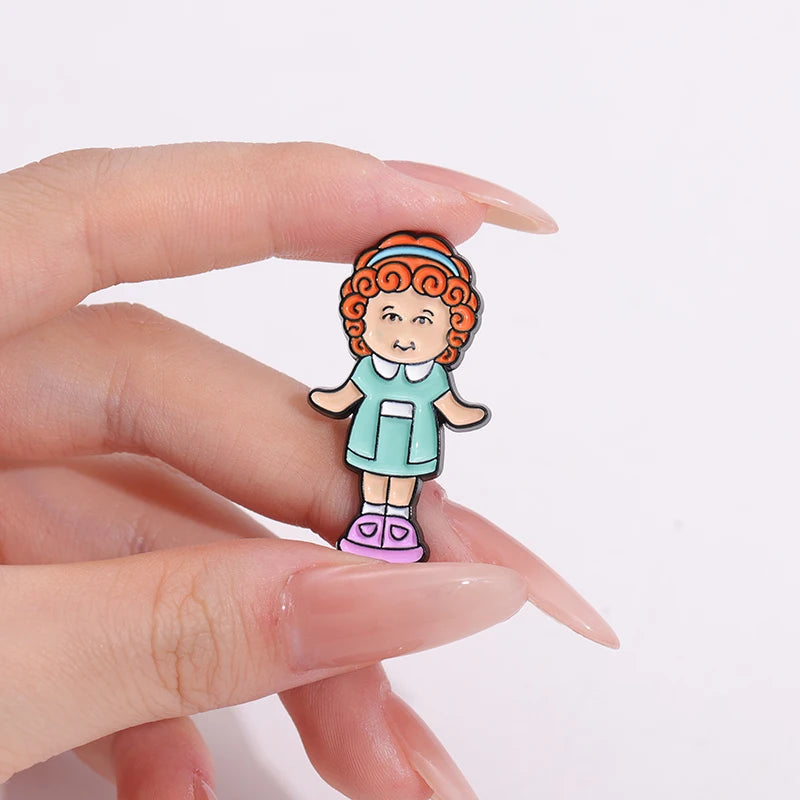 Doll pin held in hand